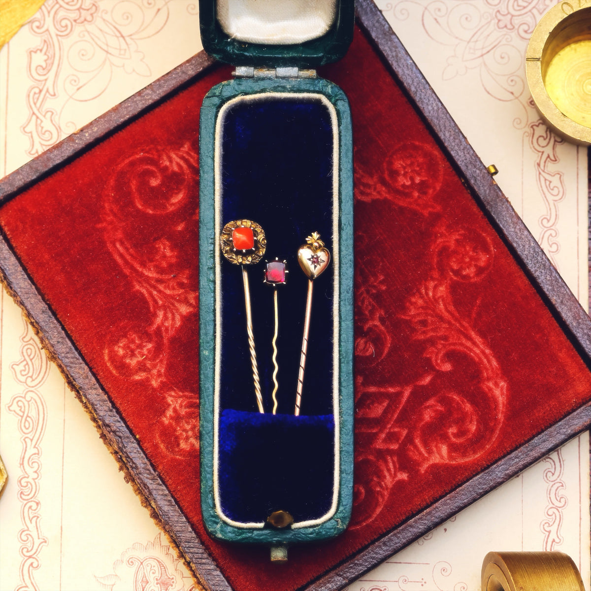 A Trio of Miniature Antique Stick Pins