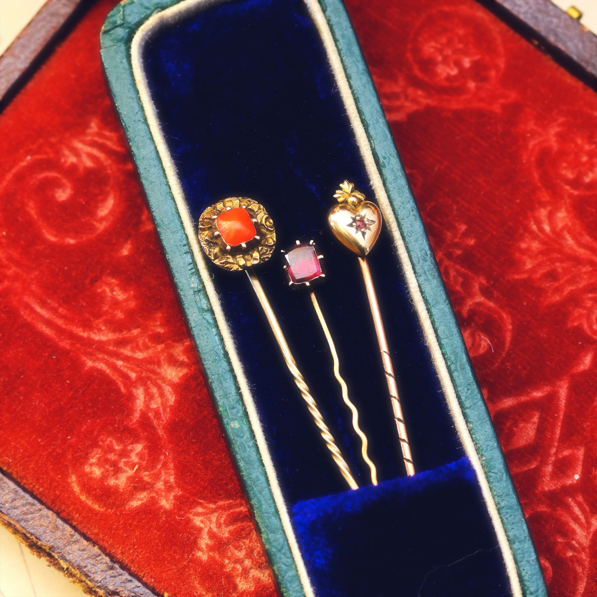 A Trio of Miniature Antique Stick Pins