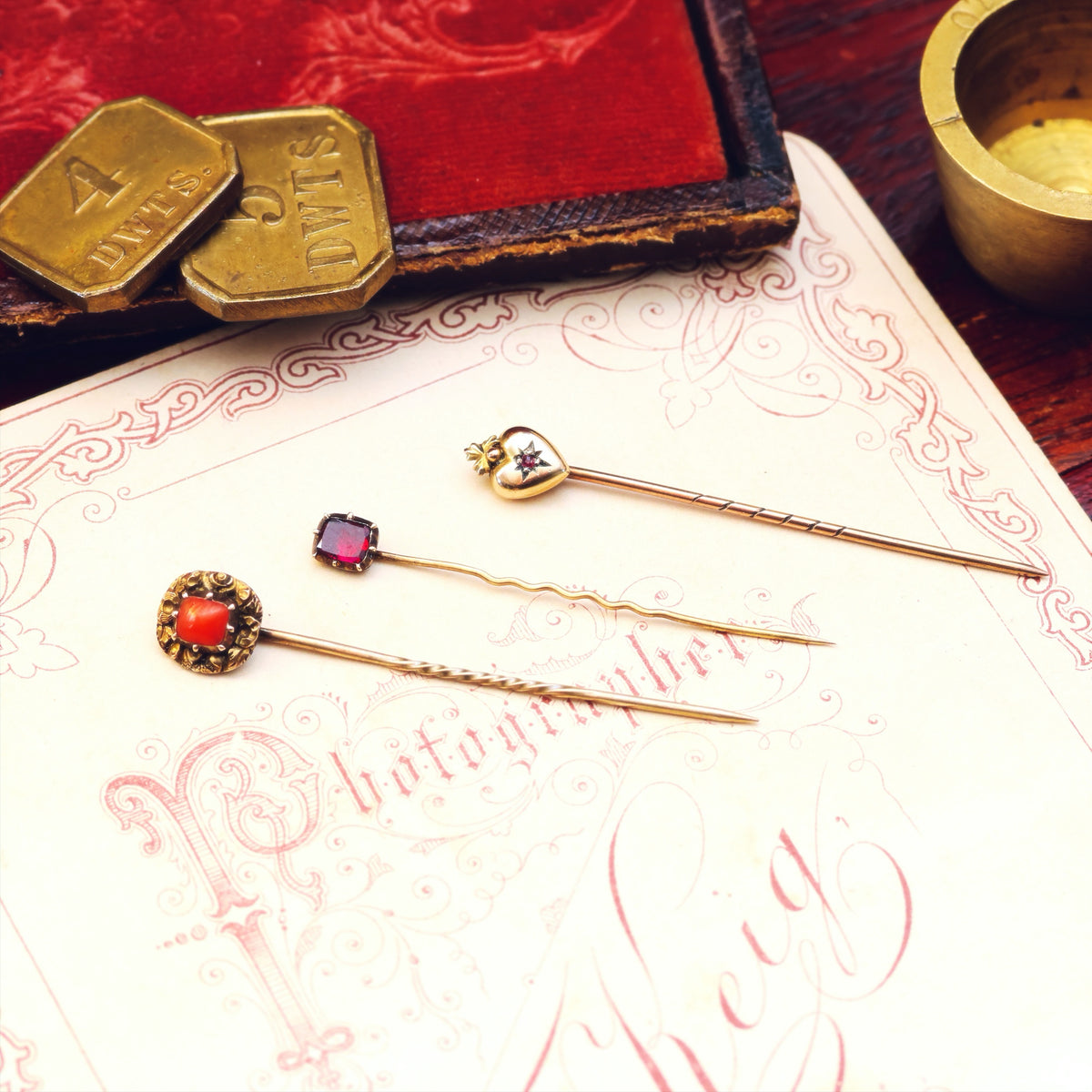 A Trio of Miniature Antique Stick Pins