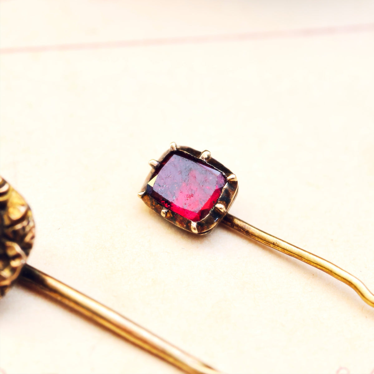 A Trio of Miniature Antique Stick Pins