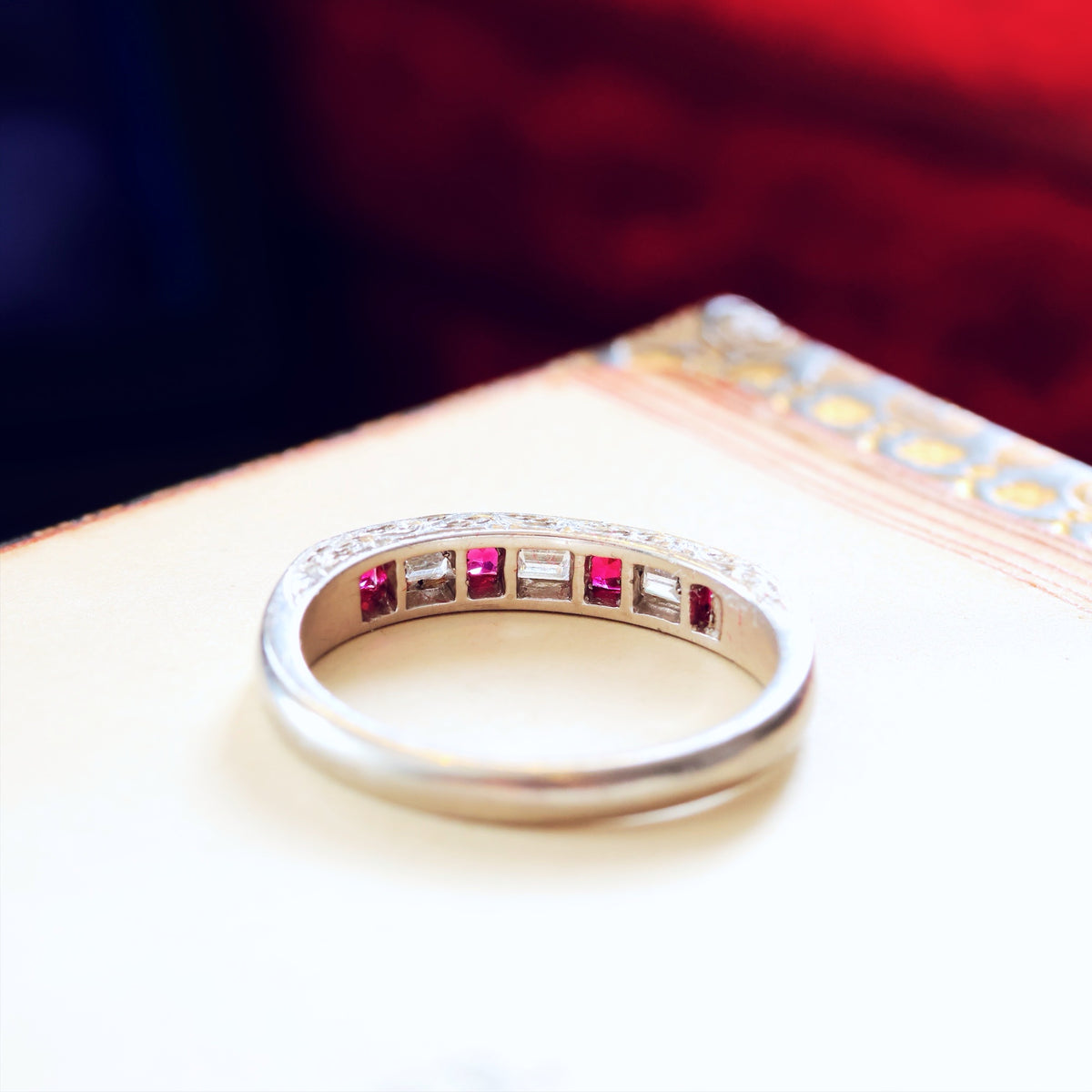 Pristine Ruby and Emerald Cut Diamond Band